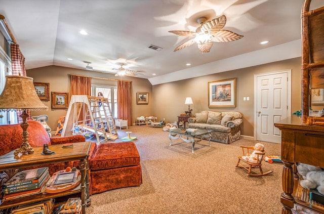 carpeted living room featuring vaulted ceiling and ceiling fan