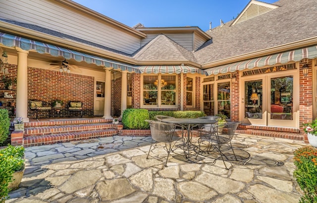 view of patio featuring ceiling fan