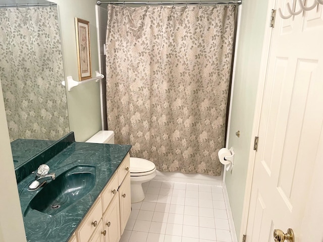 full bathroom featuring vanity, shower / bath combo with shower curtain, toilet, and tile patterned floors