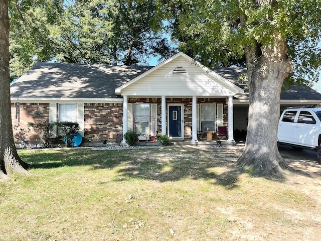 view of front of home with a front lawn and covered porch