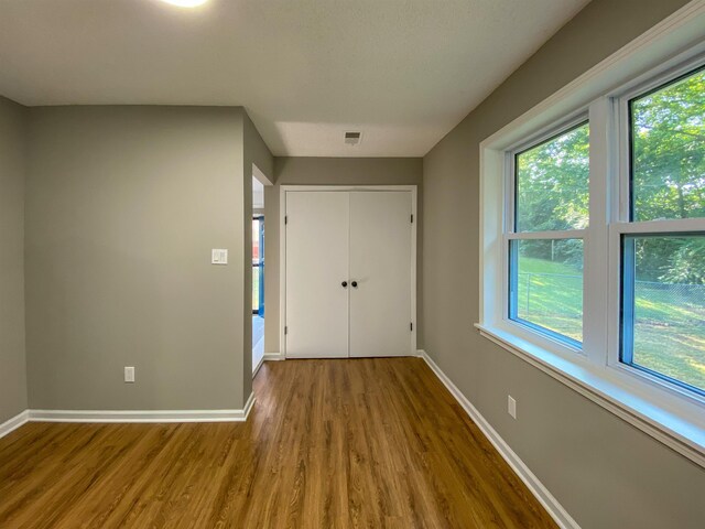 interior space with hardwood / wood-style flooring