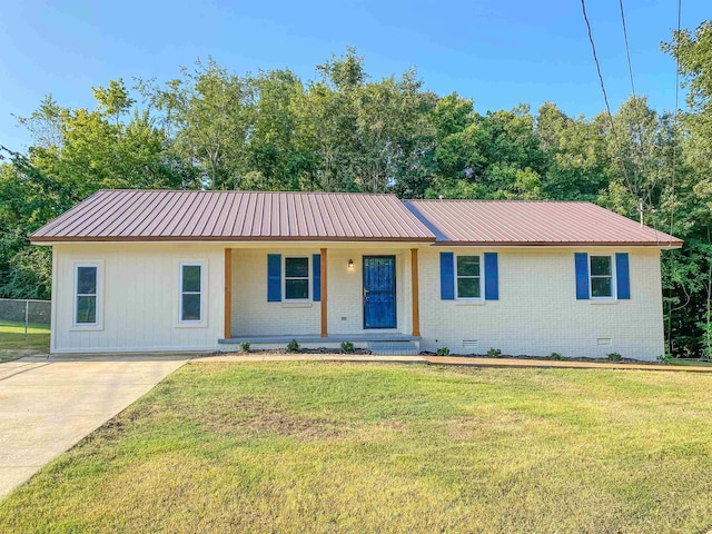 ranch-style house with a front lawn