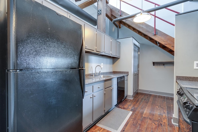 kitchen featuring gray cabinets, dark hardwood / wood-style floors, sink, and black appliances