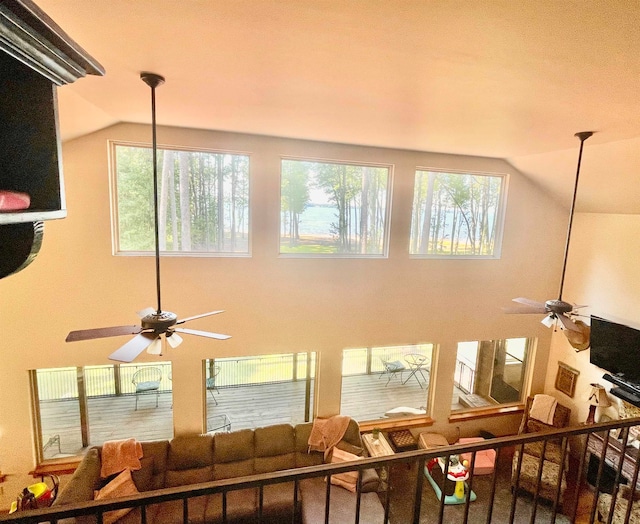 living room featuring vaulted ceiling