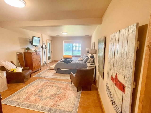 bedroom with vaulted ceiling with beams