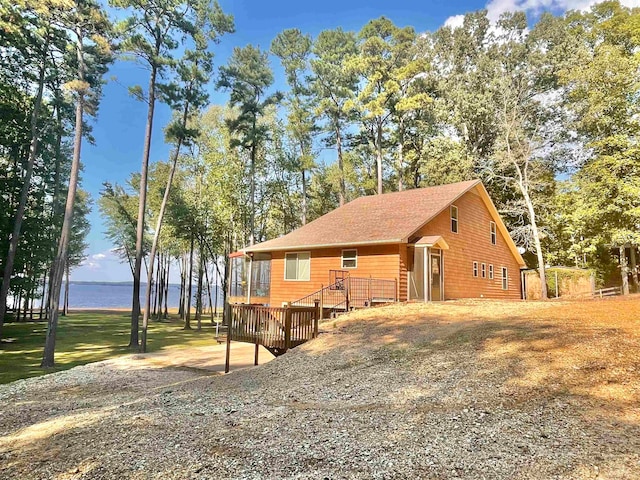 view of front of house with a wooden deck