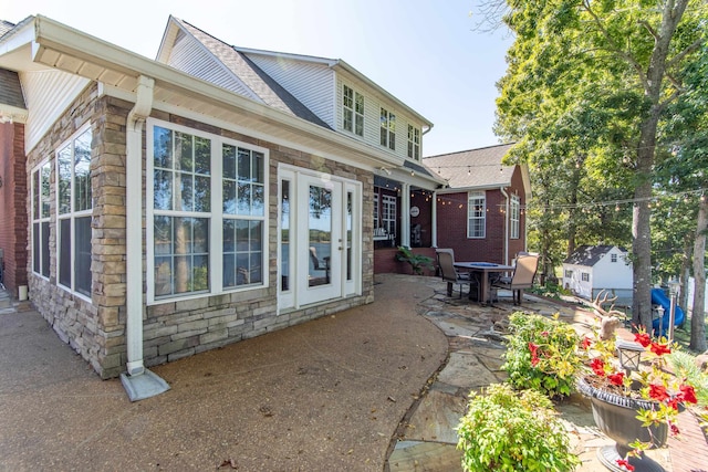 back of property with a patio area