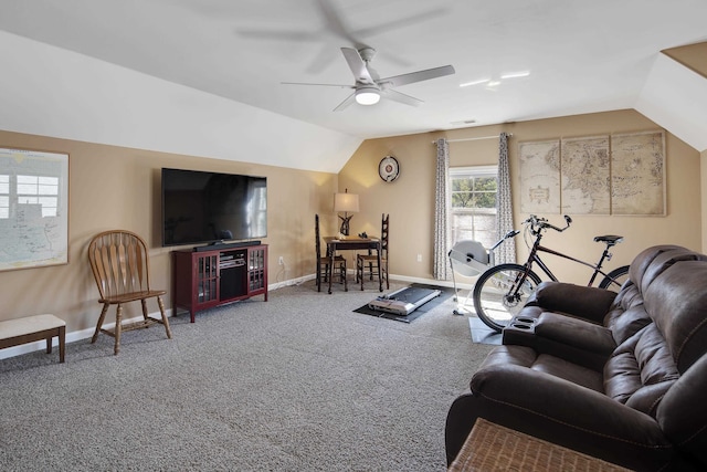 carpeted living room featuring ceiling fan and vaulted ceiling