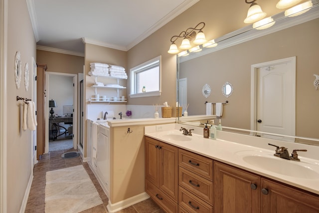 bathroom featuring crown molding, tile patterned flooring, and vanity