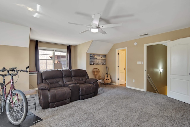 carpeted living room with ceiling fan