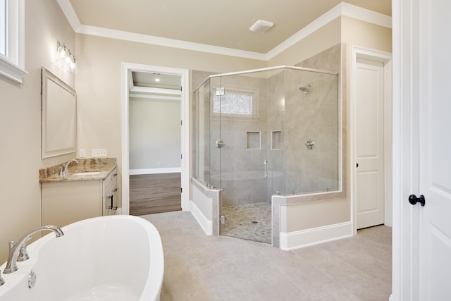 bathroom with plenty of natural light, crown molding, vanity, and independent shower and bath