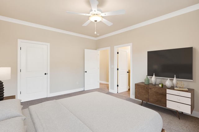 bedroom with ornamental molding, ceiling fan, and carpet flooring