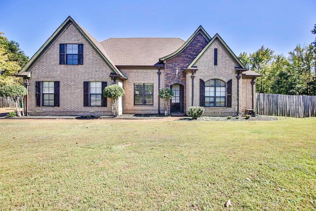 view of front of home featuring a front lawn