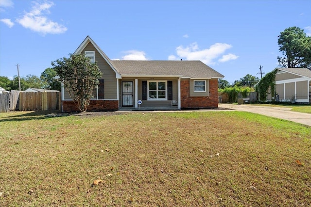 view of front facade featuring a front yard