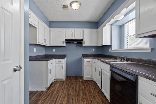 kitchen featuring black dishwasher, dark hardwood / wood-style flooring, sink, white cabinets, and a textured ceiling