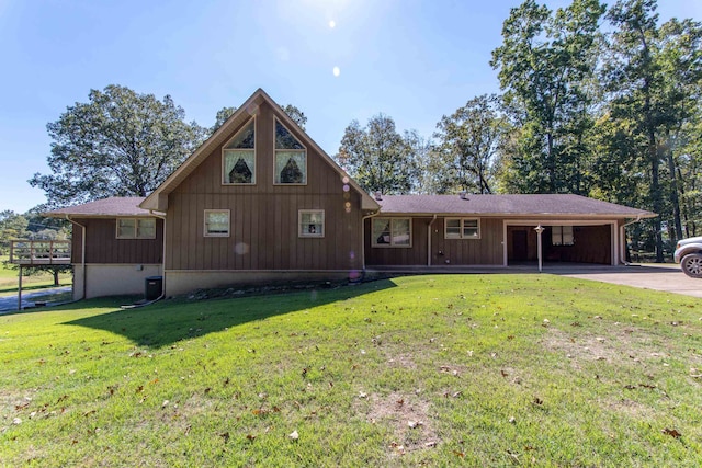 view of front of property featuring central AC unit and a front lawn