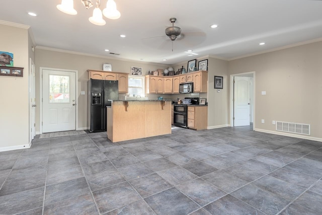 kitchen featuring a center island, a kitchen bar, crown molding, and black appliances