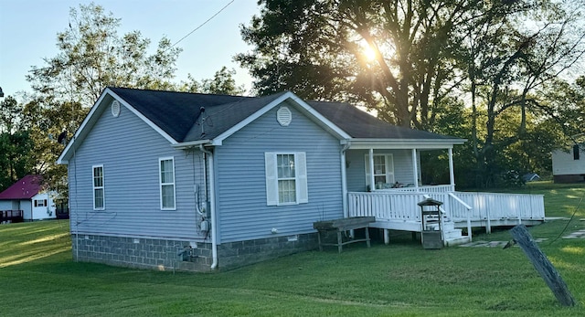 71 4th St, Gates, TN 38037 - exterior space with a lawn, roof with shingles, and a porch