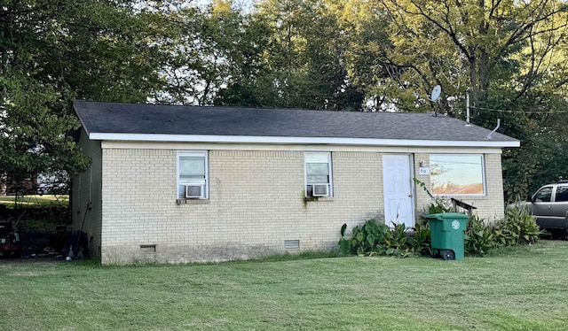 71 4th St, Gates, TN 38037 - view of front of property featuring brick siding, cooling unit, crawl space, and a front lawn