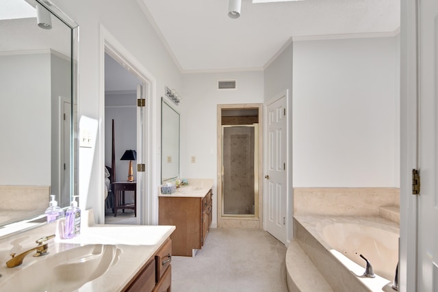 bathroom featuring vanity, separate shower and tub, and ornamental molding