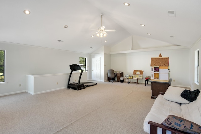 workout area featuring ornamental molding, lofted ceiling, light colored carpet, and ceiling fan