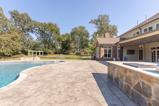 view of pool with a patio