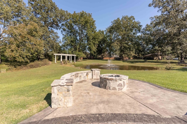 view of patio / terrace with a water view