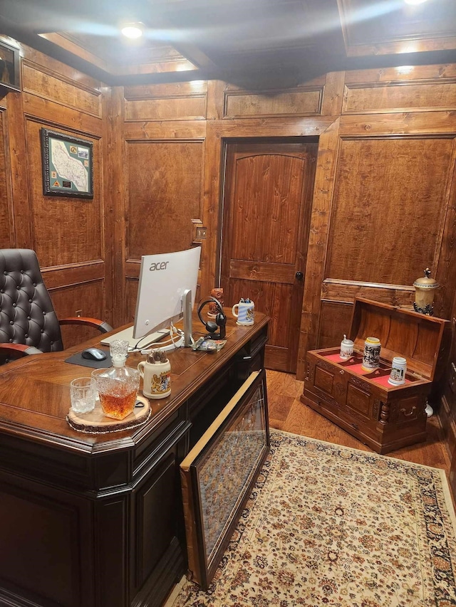 office space featuring wood walls and hardwood / wood-style floors