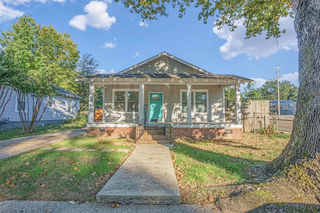 bungalow-style home featuring covered porch