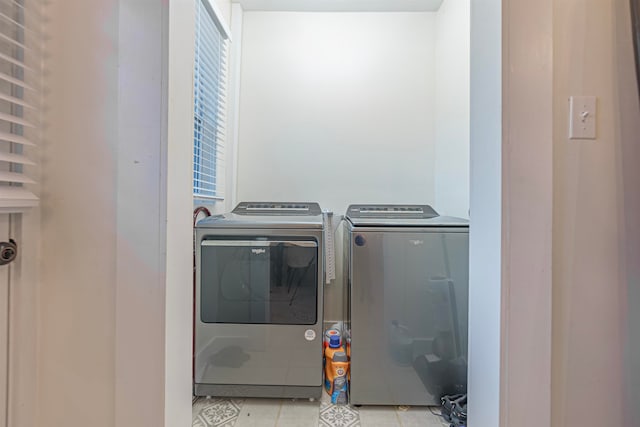 laundry room with washer and clothes dryer