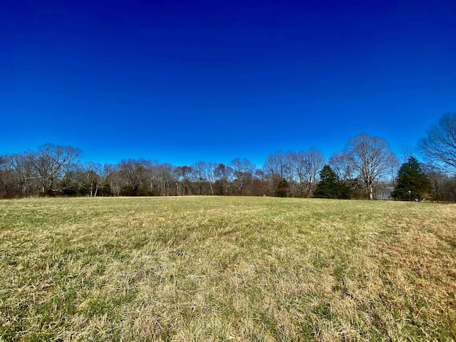 exterior space featuring a rural view