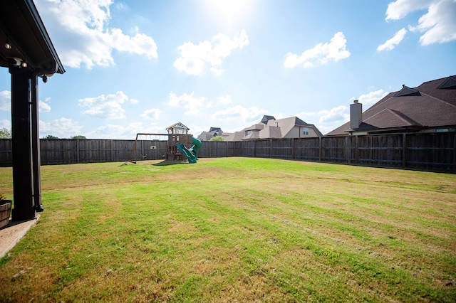 view of yard with a playground