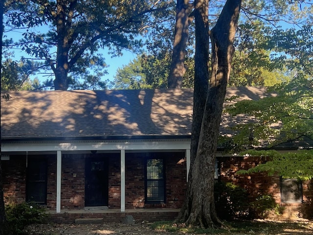 view of home's exterior featuring covered porch