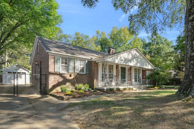 single story home featuring a porch