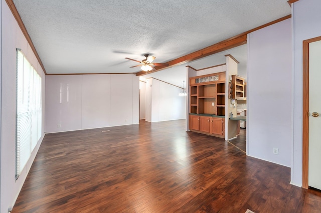 unfurnished living room with dark wood-type flooring, ceiling fan, and a textured ceiling