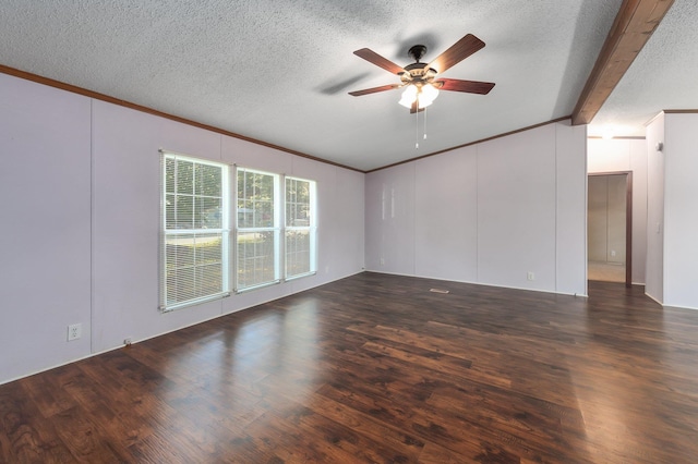 spare room with ornamental molding, ceiling fan, dark wood-type flooring, and a textured ceiling