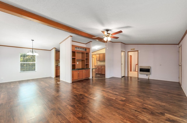 unfurnished living room with a textured ceiling, ceiling fan with notable chandelier, dark wood-type flooring, and heating unit