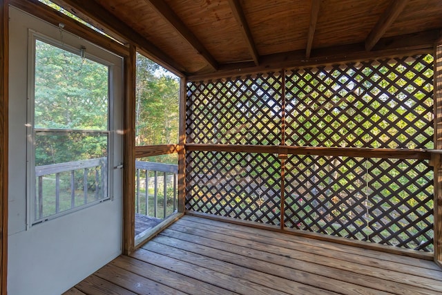 unfurnished sunroom featuring wood ceiling