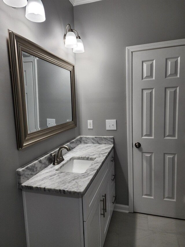 425 S Reese St S, Memphis, TN 38111 - bathroom featuring baseboards, tile patterned flooring, and vanity