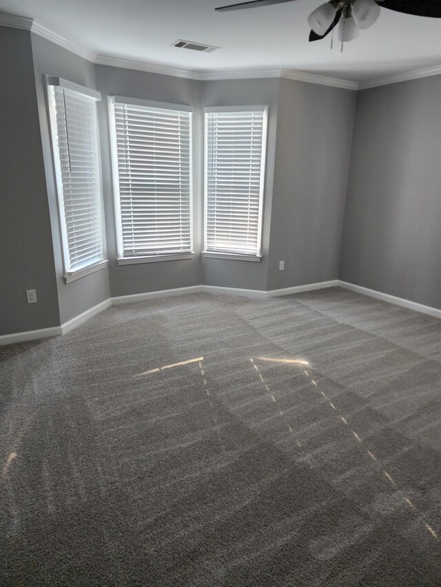 425 S Reese St S, Memphis, TN 38111 - carpeted spare room featuring visible vents, crown molding, baseboards, and ceiling fan