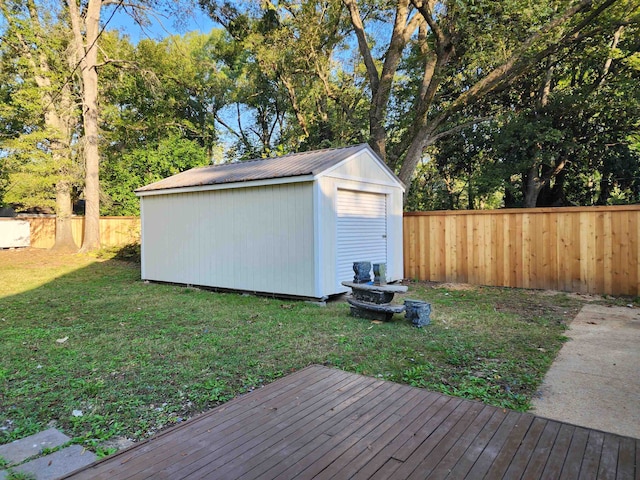 view of outdoor structure featuring a lawn