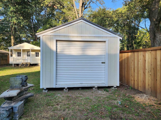 view of outdoor structure with a lawn