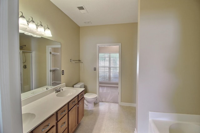 full bathroom featuring shower with separate bathtub, vanity, and toilet