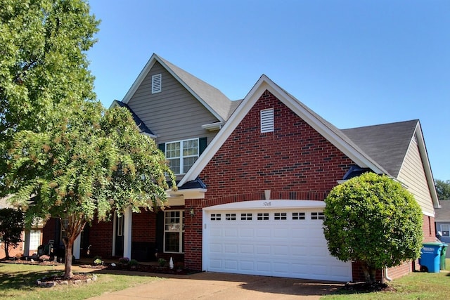 view of front of property featuring a garage