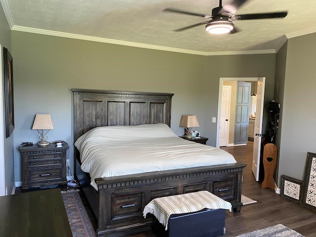 bedroom featuring dark hardwood / wood-style flooring, ornamental molding, a textured ceiling, and ceiling fan