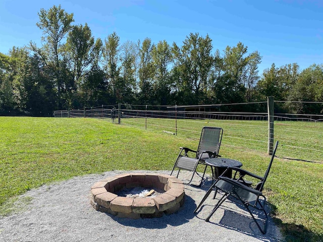 view of yard with a patio and a fire pit