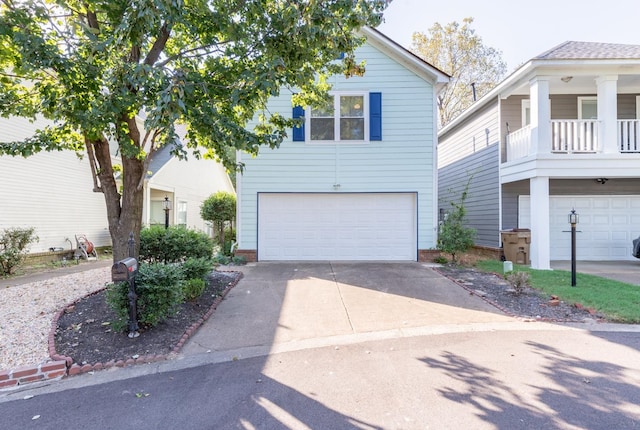 view of front of property with a garage and a balcony