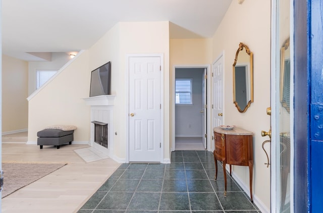 hall with dark wood-type flooring