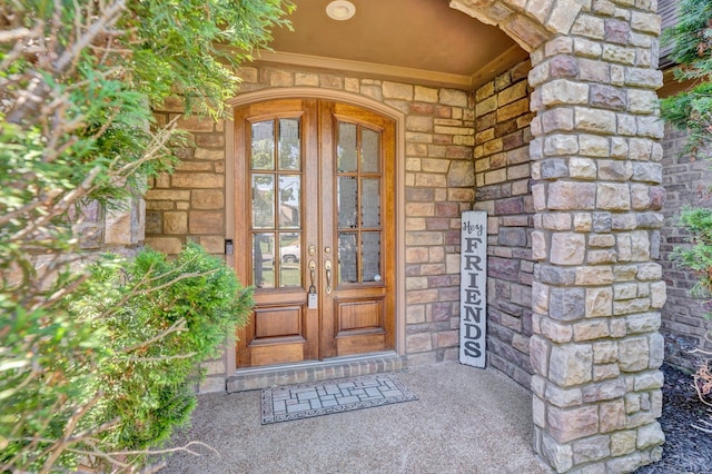 entrance to property featuring french doors