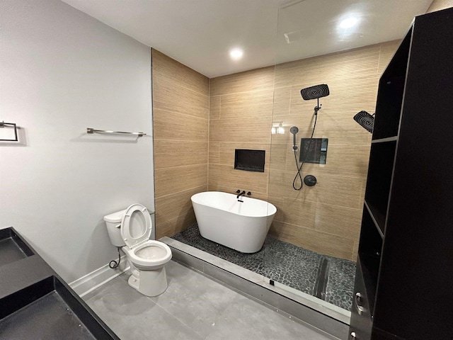 bathroom featuring toilet and plus walk in shower